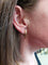 Boucles d'oreilles Créoles modernes, torsadées 58 Facettes 064431