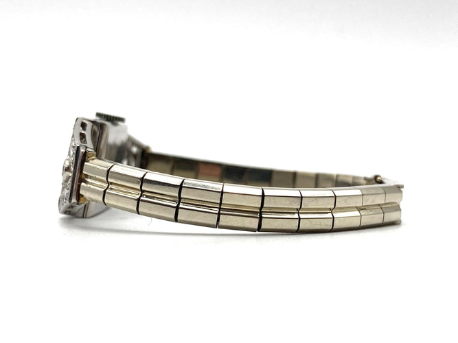 Montre Montre Art Déco platine & or blanc, diamants 2.44 cts 58 Facettes 07/07 - 16