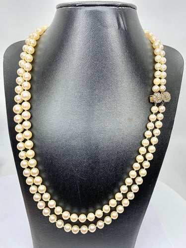 Collier Double collier de perles fermoir diamants. 58 Facettes AB170