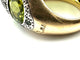 Bague 51 POMELLATO. Collection Tabou, bague or et argent ornée de péridots 58 Facettes