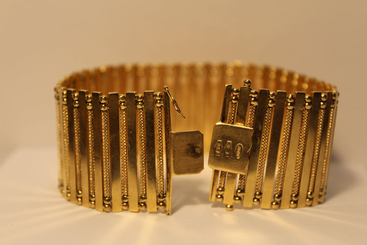 Bracelet Bracelet Manchette Or jaune 58 Facettes 11048