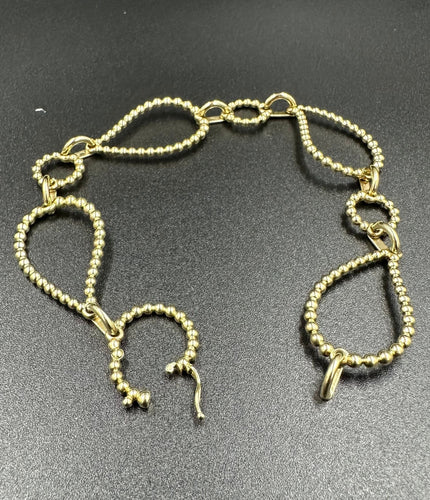 Bracelet BUCHERER. Bracelet Bubbles or jaune 18K 58 Facettes