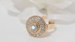 Bague Bague Rétro entourage or bicolore diamants 58 Facettes 30851