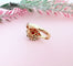 Bague 54.5 Bague Fleur Grenats Or Jaune 58 Facettes AA 1485