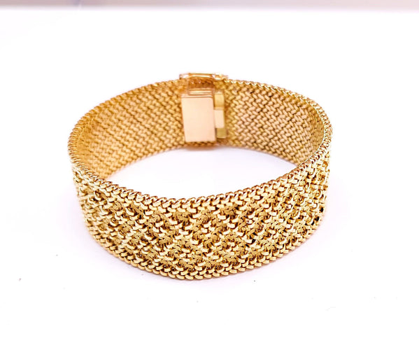 Bracelet Bracelet manchette or jaune Années 60 58 Facettes RA-94