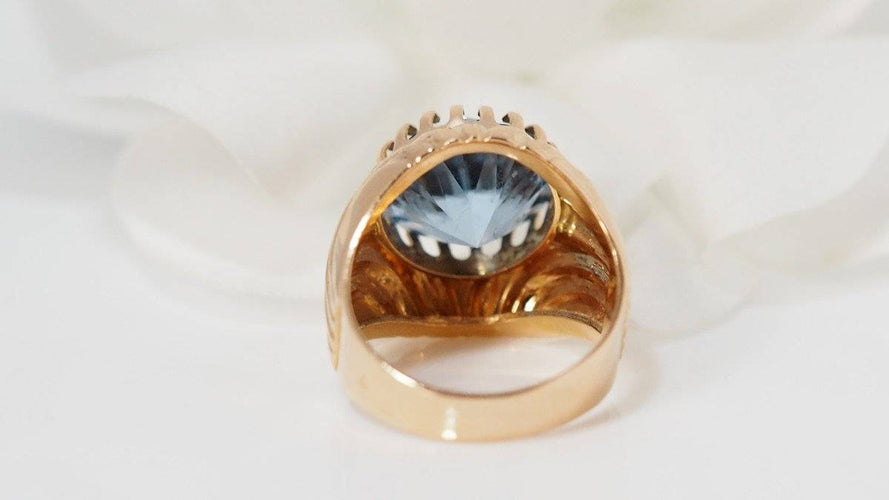 Bague Bague godronnée or jaune et topaze bleue 58 Facettes 30912
