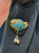 Broche BROCHE ANCIENNE PERLES ET TURQUOISES 58 Facettes 053641