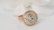 Bague Bague Rétro entourage or bicolore diamants 58 Facettes 30851