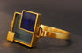 Bracelet Bracelet en métal doré et plexis bleu clair et bleu foncé. 58 Facettes 1035055