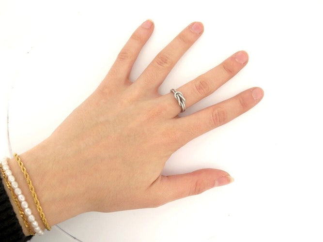 Bague 52 vintage bague HERMES audiernes noeud d heracles tresse argent massif 58 Facettes 256620