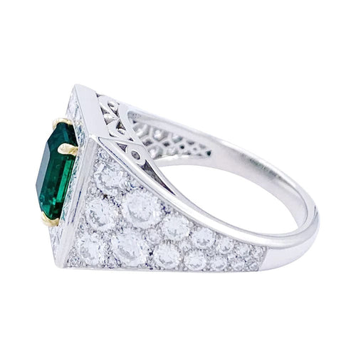 Bague 53 Bague, platine, or jaune, émeraude et diamant. 58 Facettes 32224