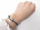 Bracelet bracelet DINH VAN cible gm en or blanc 18k diamants cordon gris 58 Facettes 239410