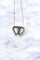 Collier Collier ancien double cœur perles 58 Facettes