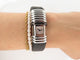 Montre vintage montre CARTIER declaration titane & acier 4 diamants 0.12ct quartz 58 Facettes 254101