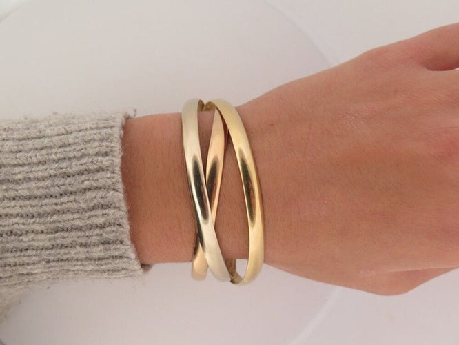 Bracelet bracelet 3 anneaux en or jaune blanc et rose 18k 23 cm trinity 58 Facettes 257839