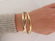 Bracelet bracelet 3 anneaux en or jaune blanc et rose 18k 23 cm trinity 58 Facettes 257839