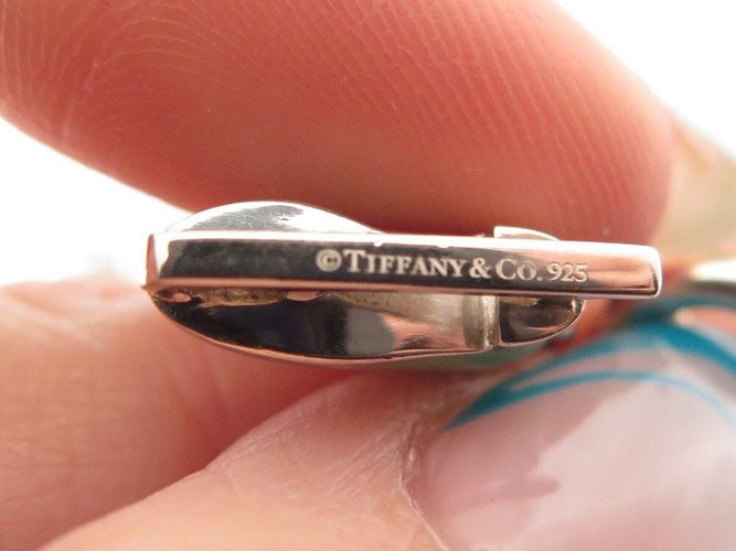 Bracelet bracelet TIFFANY & CO chaine a breloques charms 19 argent 58 Facettes 254453