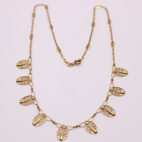 Collier Collier ancien, Draperie, Or jaune 18 carats, Filigrane 58 Facettes