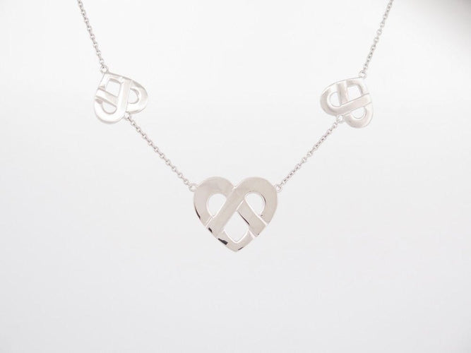 Collier collier POIRAY coeur entrelace multi 80-84 en or blanc 18k 58 Facettes 253874