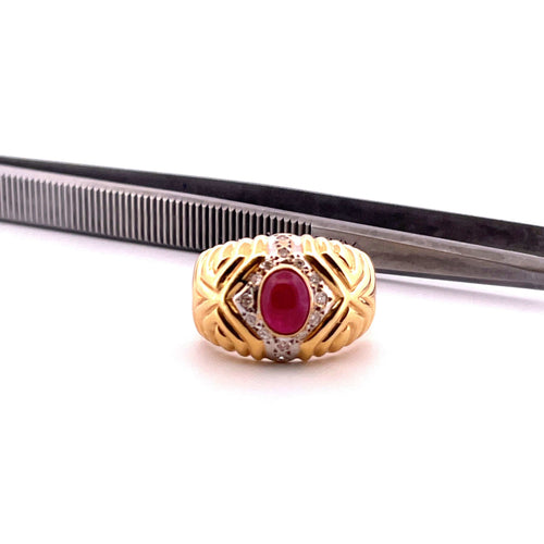 Bague Bague vintage en or jaune, rubis cabochon et diamants 58 Facettes