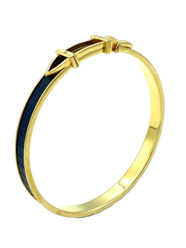 Bracelet Hermès. Bracelet jonc métal doré et cuir 58 Facettes