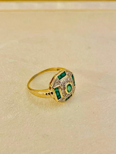 Bague 55 Bague 2 ors, émeraudes et diamants 58 Facettes
