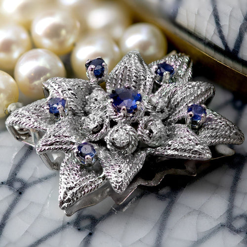 Bracelet Bracelet 4 rangs de perles fermoir or blanc saphirs diamants 58 Facettes 22-125