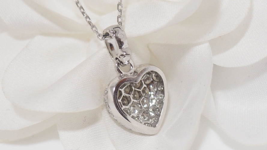 Collier Collier Cartier pendentif cœur, or blanc et diamants 58 Facettes 13807