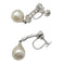 Boucles d'oreilles Boucles d'oreilles Mellerio dits Meller en or, platine, diamants et perles. 58 Facettes 31910