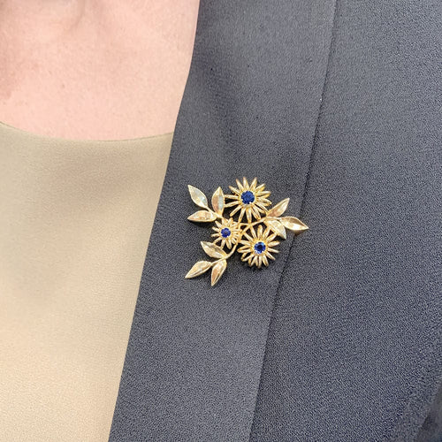 Broche Broche Boucheron "Fleurs" en or rose et saphirs. 58 Facettes 31646