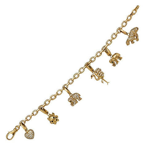 Bracelet Bracelet Cartier en or jaune, 6 breloques, diamants, émeraudes et rubis. 58 Facettes 30849/55