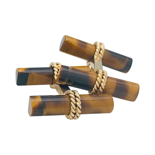 Boutons de manchette Boutons de manchette Boucheron en or jaune et oeil de tigre . 58 Facettes 31495