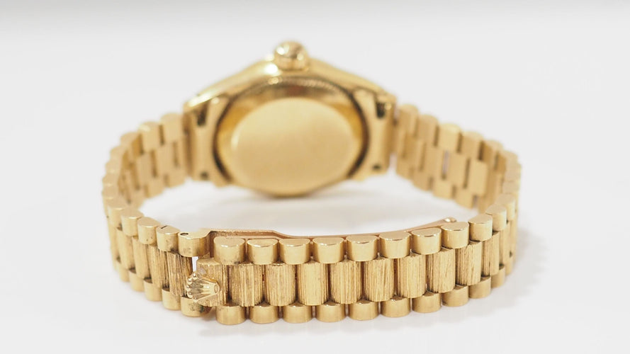 Montre 14 Montre Rolex Lady Oyster Perpetual en or jaune 18kt 58 Facettes 31934