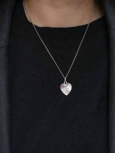 Pendentif Médaille amour Augis cœur Or blanc Rubis Plus qu’hier moins que demain 58 Facettes J238