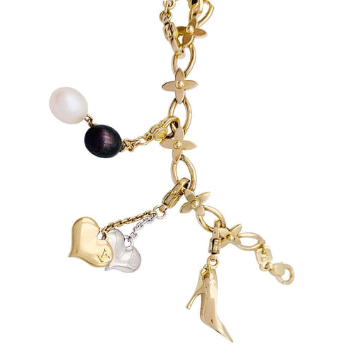 Bracelet Bracelet Louis Vuitton, "Idylle", breloques, or jaune, or blanc, perles. 58 Facettes 33013