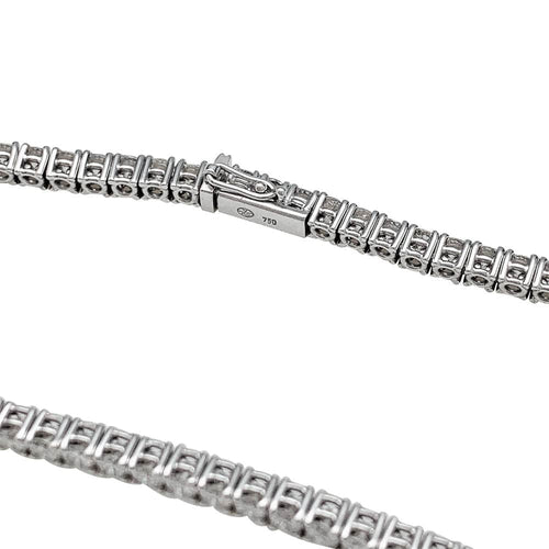 Bracelet Ligne tennis Gubelin or blanc diamants. 58 Facettes 30975