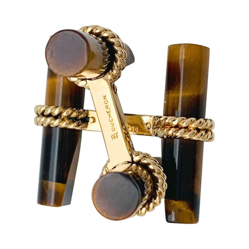 Boutons de manchette Boutons de manchette Boucheron en or jaune et oeil de tigre . 58 Facettes 31495