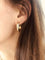 Boucles d'oreilles Créole en 3 ors de la maison Cartier modèle Trinity 58 Facettes