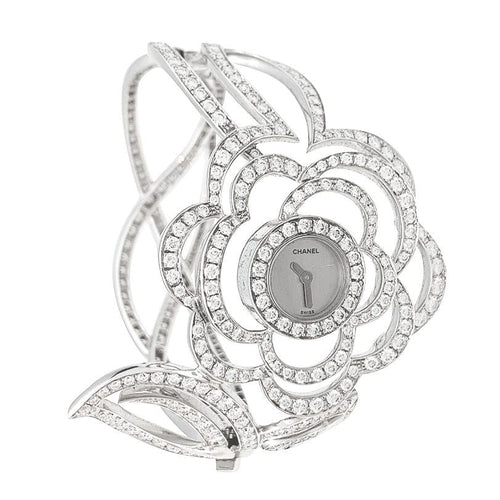 Montre Montre Chanel "Fil de Camélia" en or blanc et diamants. 58 Facettes 31123