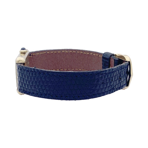 Montre Montre Cartier "Tank Must" argent plaqué or, cadran laqué bleu. 58 Facettes 33539