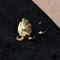 Broche Broche éléphant or onyx diamants émeraude 58 Facettes 21-796