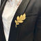 Broche Broche feuille or jaune. 58 Facettes 32706