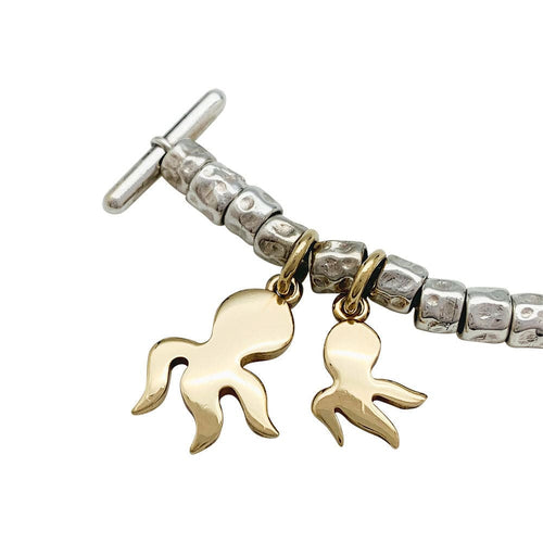 Bracelet Bracelet breloques Dodo, argent et or. 58 Facettes 31776
