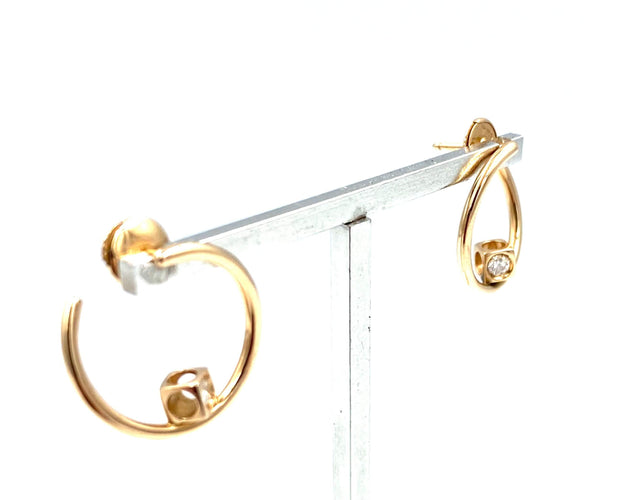 Boucles d'oreilles DINH VAN. Collection Cube Diamants, créoles en or rose 18K et diamants 58 Facettes