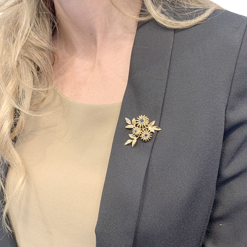 Broche Broche Boucheron "Fleurs" en or rose et saphirs. 58 Facettes 31646