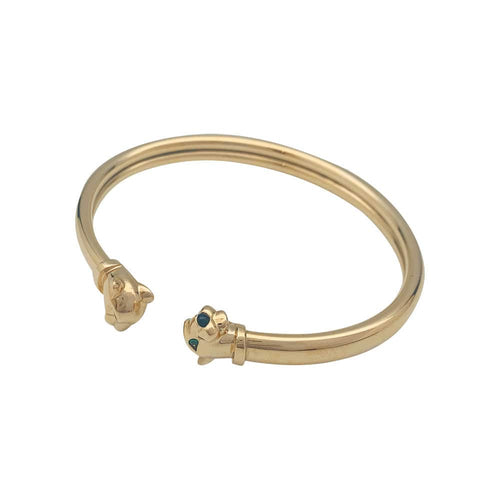 Bracelet Bracelet Cartier "Panthère" en or jaune, tsavorites et onyx. 58 Facettes 31325