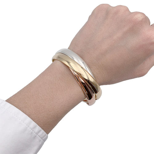 Bracelet Bracelet Cartier, "Trinity", 3 tons d'or. 58 Facettes 32580