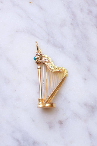 Pendentif Pendentif Victorien Harpe en or jaune et turquoise à compartiment secret 58 Facettes