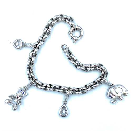 Bracelet CHOPARD. Collection Happy Diamonds, bracelet or blanc et breloques 58 Facettes