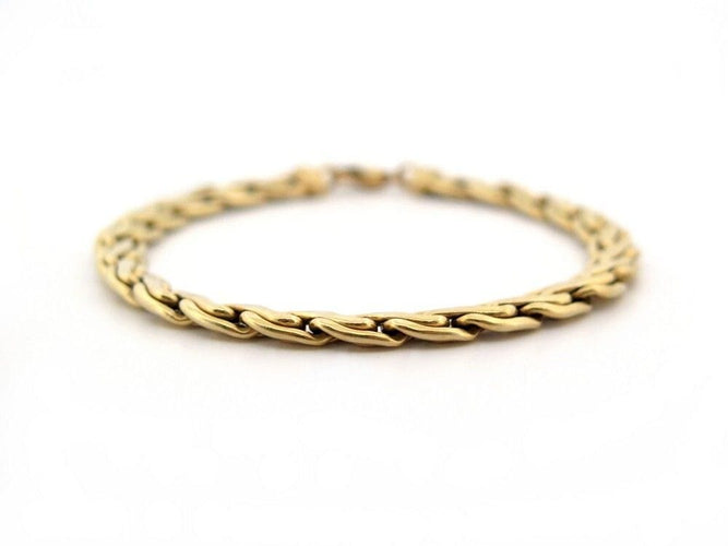 Bracelet bracelet gourmette maille torsadee en or jaune 18k 58 Facettes 254718